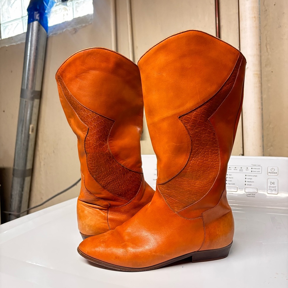 Vibrant Orange Heeled Boots with Western Style